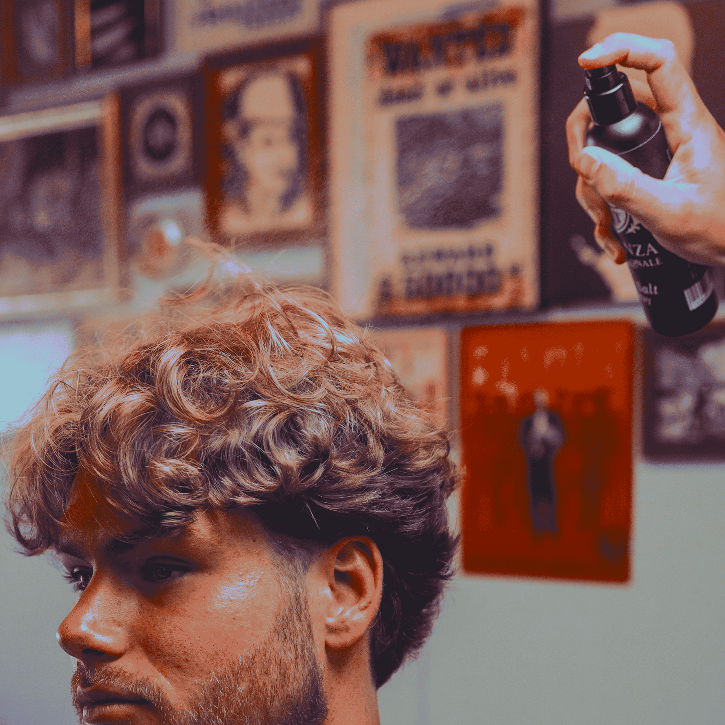 Essenza Sea Salt Spray being sprayed on hair to give texture and volume to hair