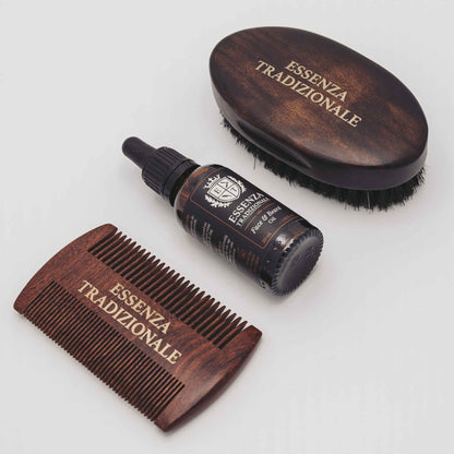 Wooden comb, brush, and bottle of hair product with 'Essenza Tradizionale' branding on a light gray background.