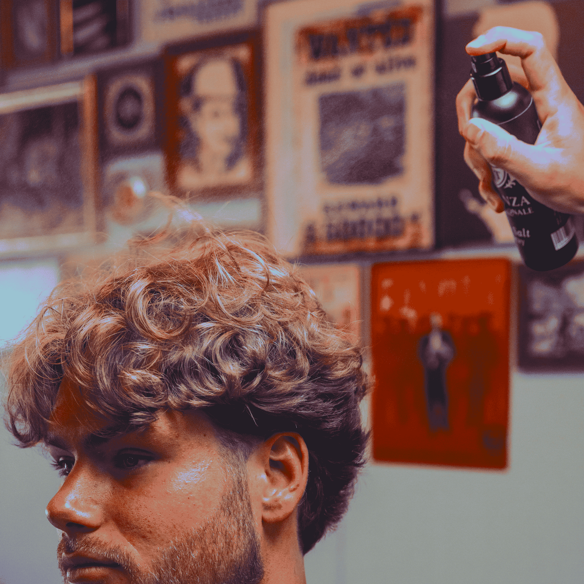 Essenza Sea Salt Spray being sprayed on hair to give texture and volume to hair